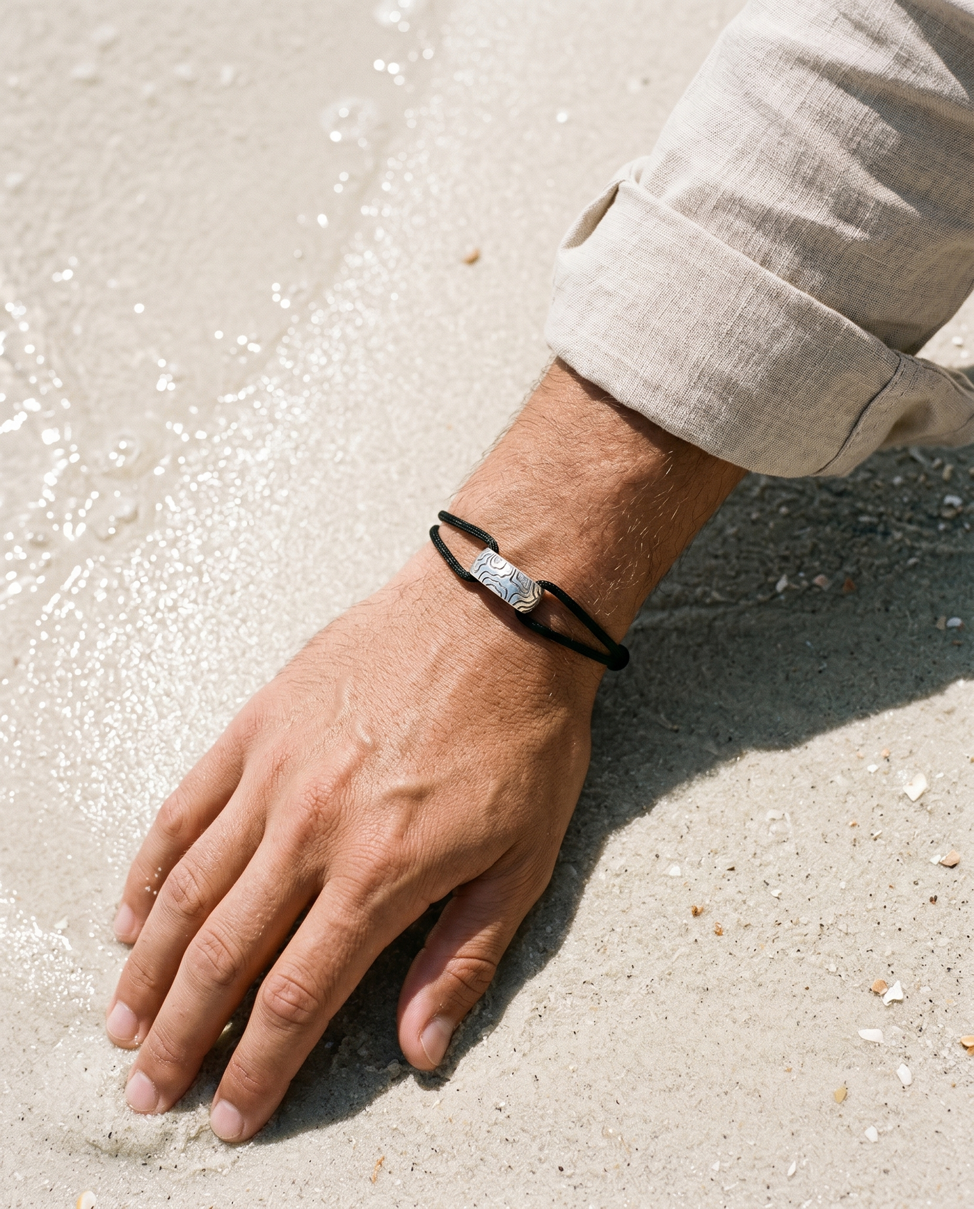 GRIT black cord beach lifestyle